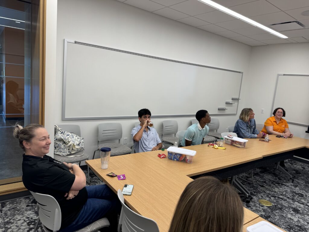 Group of people sitting at a table